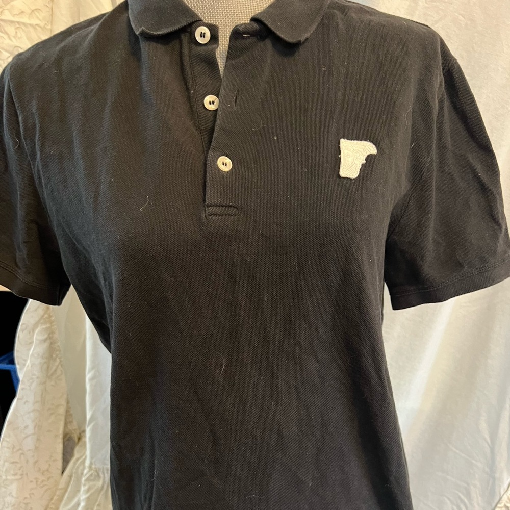 Black polo shirt. Versace
